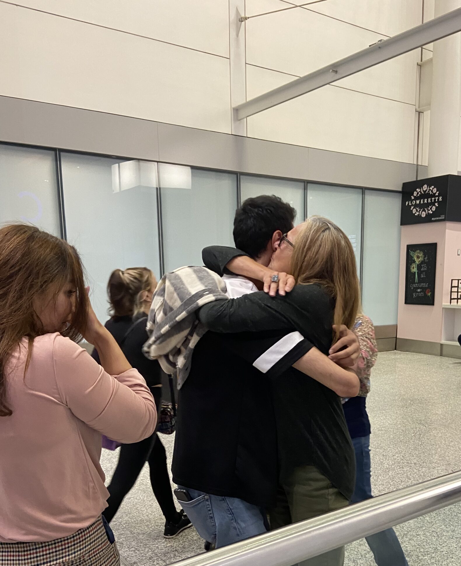 Joan Leishman at airport with PEN Writers in Exile